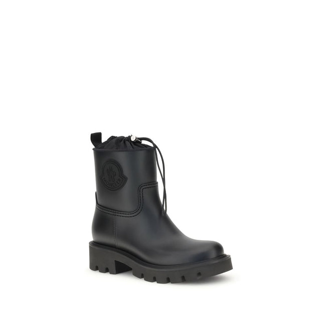 Black Rubber Lace-Up BootsMoncler’s Kickstream rubber Boots combine functionality and style with distinctive details. Featuring a round toe, they feature a tonal logo applique on the side and logo fabric inserts on the back. The drawstring closure and bac