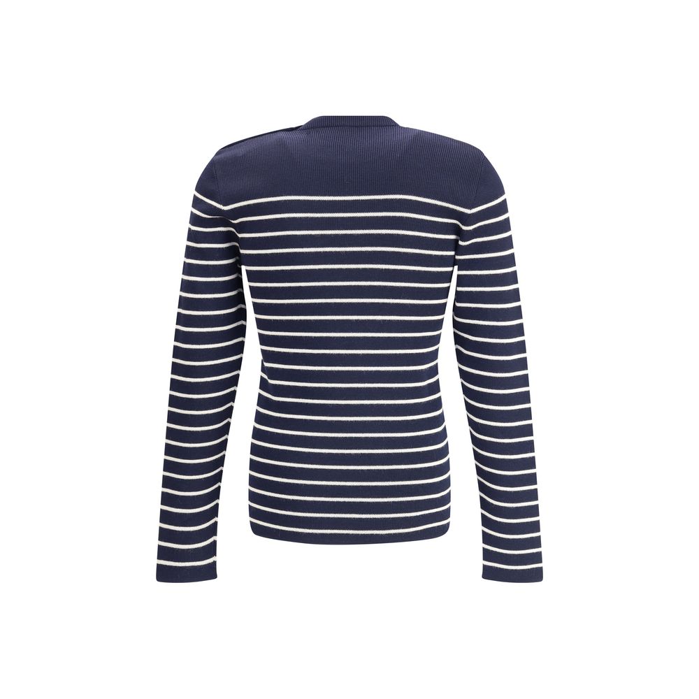 Blue Fleece Wool SweatshirtPrada’s virgin wool striped Sweater combines classicism and contemporary identity. Featuring a ribbed crew neck, it features a vibrant striped pattern and the iconic jacquard signature on the front, a distinctive detail that sig