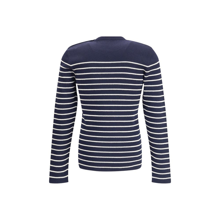 Blue Fleece Wool SweatshirtPrada’s virgin wool striped Sweater combines classicism and contemporary identity. Featuring a ribbed crew neck, it features a vibrant striped pattern and the iconic jacquard signature on the front, a distinctive detail that sig
