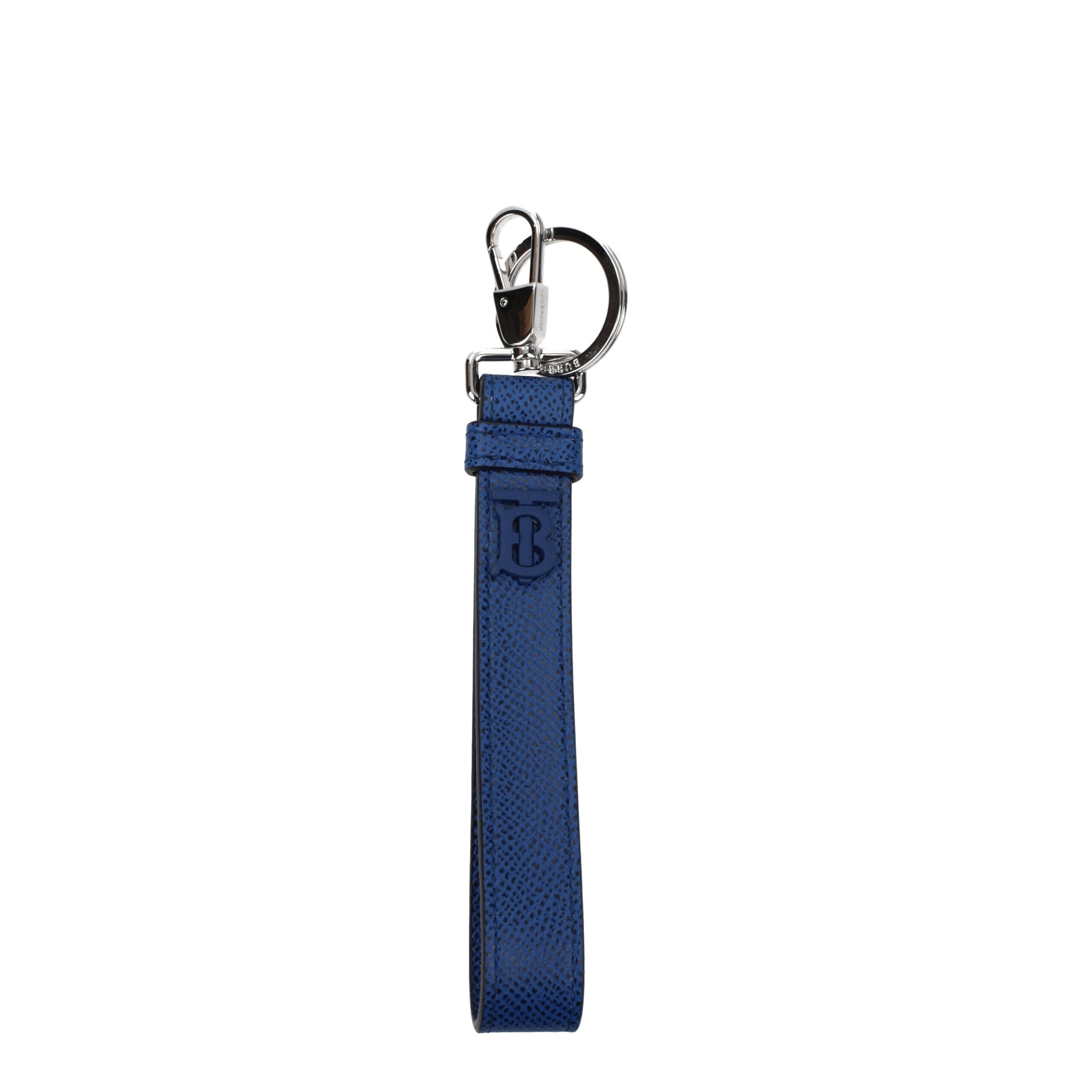 Blue Leather KeychainDescription: The product with MPN 8065994 and code F77975 leather in blue is a keychain designed by Burberry. It has features like front logo. Additional Info: Style: Casual Closing type: Clips Closure Materials: Leather Measurements: