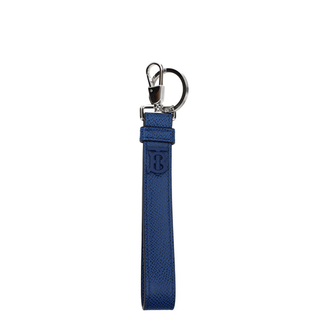 Blue Leather KeychainDescription: The product with MPN 8065994 and code F77975 leather in blue is a keychain designed by Burberry. It has features like front logo. Additional Info: Style: Casual Closing type: Clips Closure Materials: Leather Measurements:
