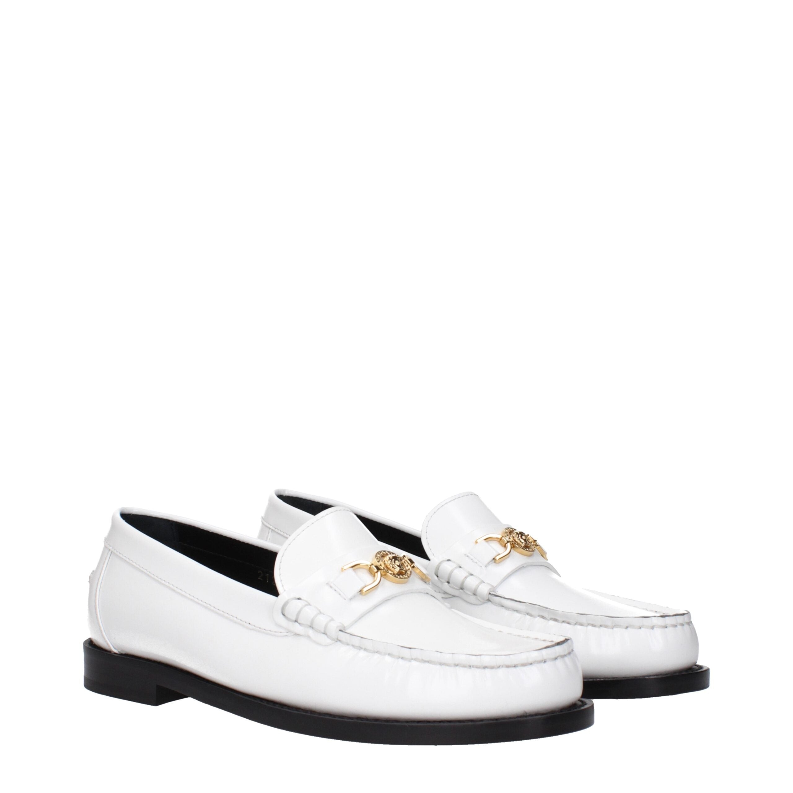 White Leather Slip-On LoafersDescription: The product with MPN 10121231A087731W00V and code F82515 leather in white is a loafers designed by Versace. It has features like front detail, front logo.White Leather Slip-On Loafers${tagsVersaceAulae White Leath