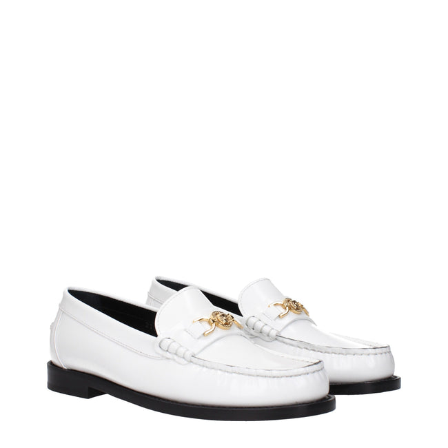 White Leather Slip-On LoafersDescription: The product with MPN 10121231A087731W00V and code F82515 leather in white is a loafers designed by Versace. It has features like front detail, front logo.White Leather Slip-On Loafers${tagsVersaceAulae White Leath