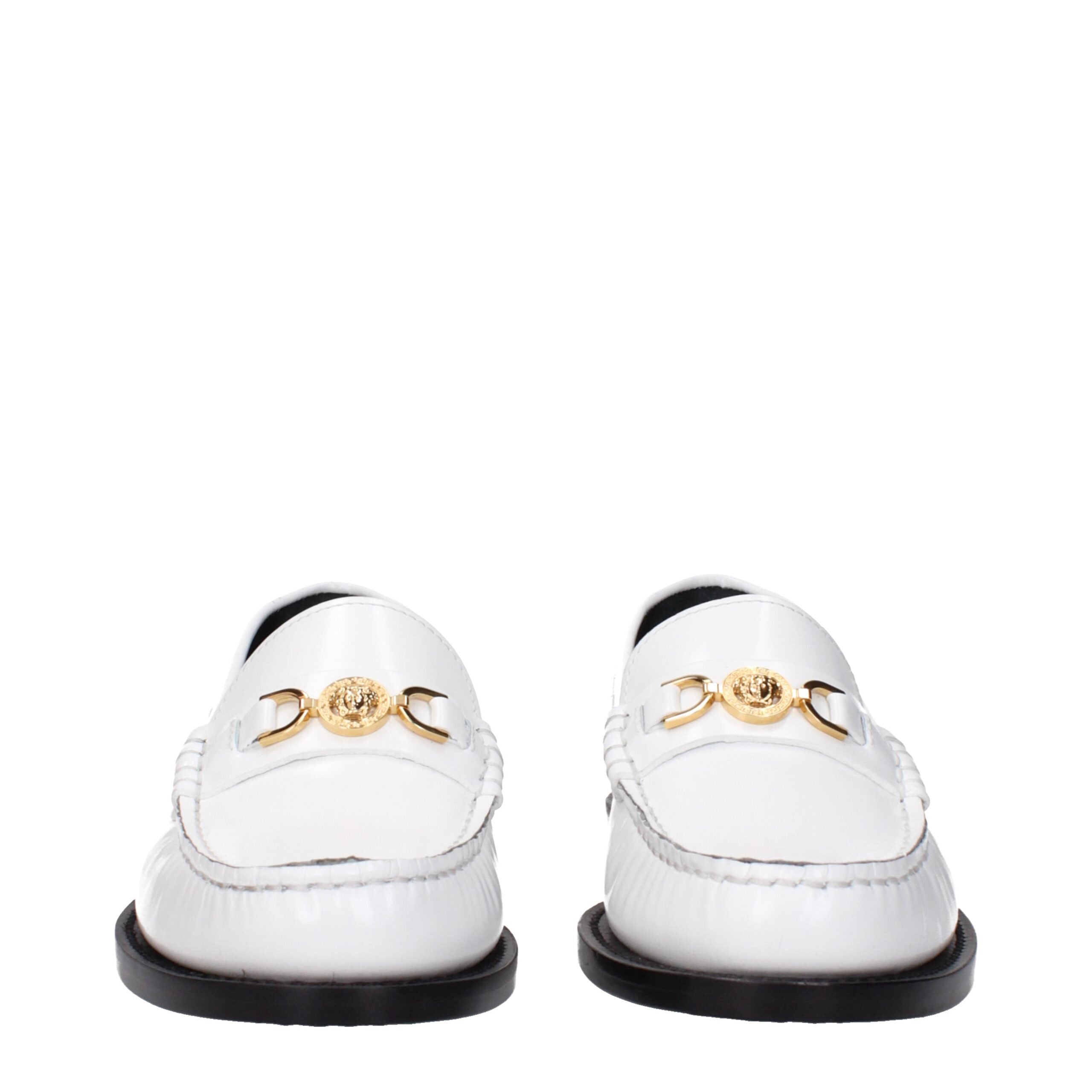 White Leather Slip-On LoafersDescription: The product with MPN 10121231A087731W00V and code F82515 leather in white is a loafers designed by Versace. It has features like front detail, front logo.White Leather Slip-On Loafers${tagsVersaceAulae White Leath