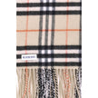 Beige Wool ScarfBurberry’s wool and cashmere Blanket is a symbol of luxury and tradition. Made in a prestigious Scottish textile mill with over 200 years of history, this blanket is woven with the iconic Burberry Check, a globally recognizable pattern. Th
