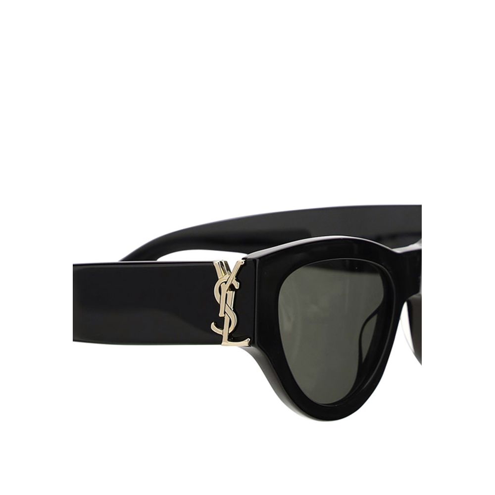Black Acetate SunglassesThe Saint Laurent Cat-Eye Sunglasses are an elegant and bold accessory that combines a touch of vintage glamour with a contemporary style. The cat-eye shape, with its thin lines and raised sides, gives a feminine and sophisticated
