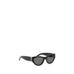 Black Acetate SunglassesThe Saint Laurent Cat-Eye Sunglasses are an elegant and bold accessory that combines a touch of vintage glamour with a contemporary style. The cat-eye shape, with its thin lines and raised sides, gives a feminine and sophisticated