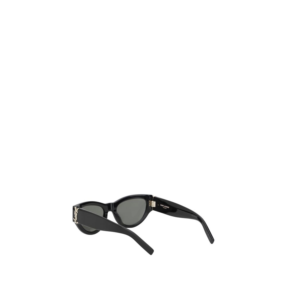 Black Acetate SunglassesThe Saint Laurent Cat-Eye Sunglasses are an elegant and bold accessory that combines a touch of vintage glamour with a contemporary style. The cat-eye shape, with its thin lines and raised sides, gives a feminine and sophisticated