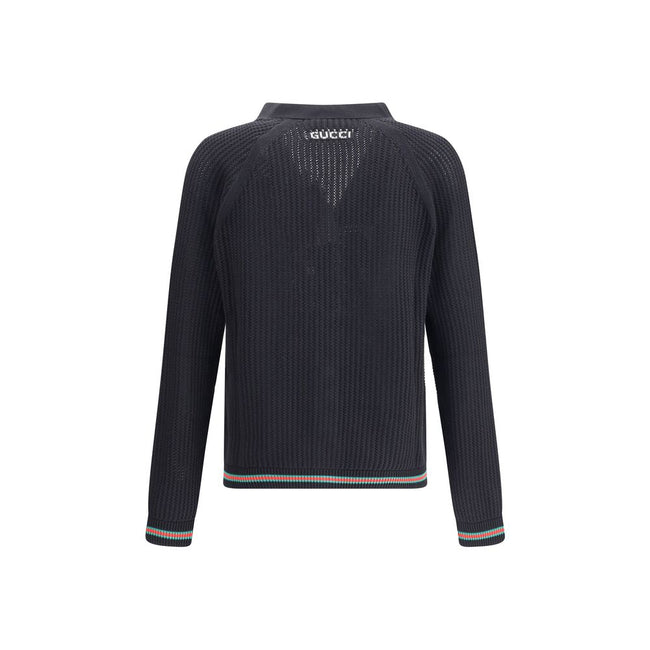Black Cotton CardiganCotton cardigan from Gucci features a V-neck front and front button closure for a classic, refined style. Raglan sleeves ensure comfort and freedom of movement, while the knit weave lends a touch of elegant texture. Ribbed cuffs and h