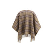 Brown Wool CoatThe Burberry Check Cape is crafted from a luxurious blend of wool and cashmere and features a double-faced finish featuring the iconic Burberry Check motif. The fabric, washed twice in local spring water, acquires an extraordinary softness