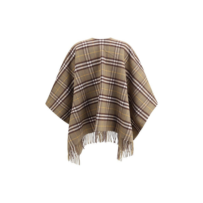 Brown Wool CoatThe Burberry Check Cape is crafted from a luxurious blend of wool and cashmere and features a double-faced finish featuring the iconic Burberry Check motif. The fabric, washed twice in local spring water, acquires an extraordinary softness