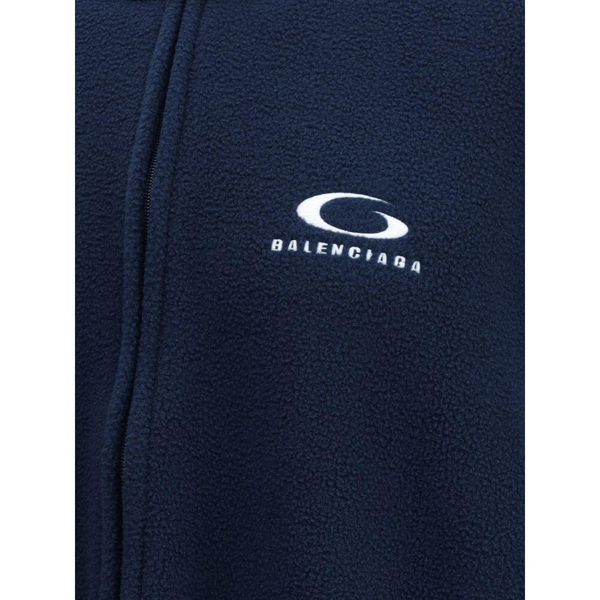 Blue Polyester BomberBalenciaga’s Loop Sports Icon zip Jacket by Balenciaga, made of fleece terry, combines comfort and sporty character. Featuring a double-slider zipper closure, it has long sleeves, two zipper pockets and gathered trim at the cuffs and