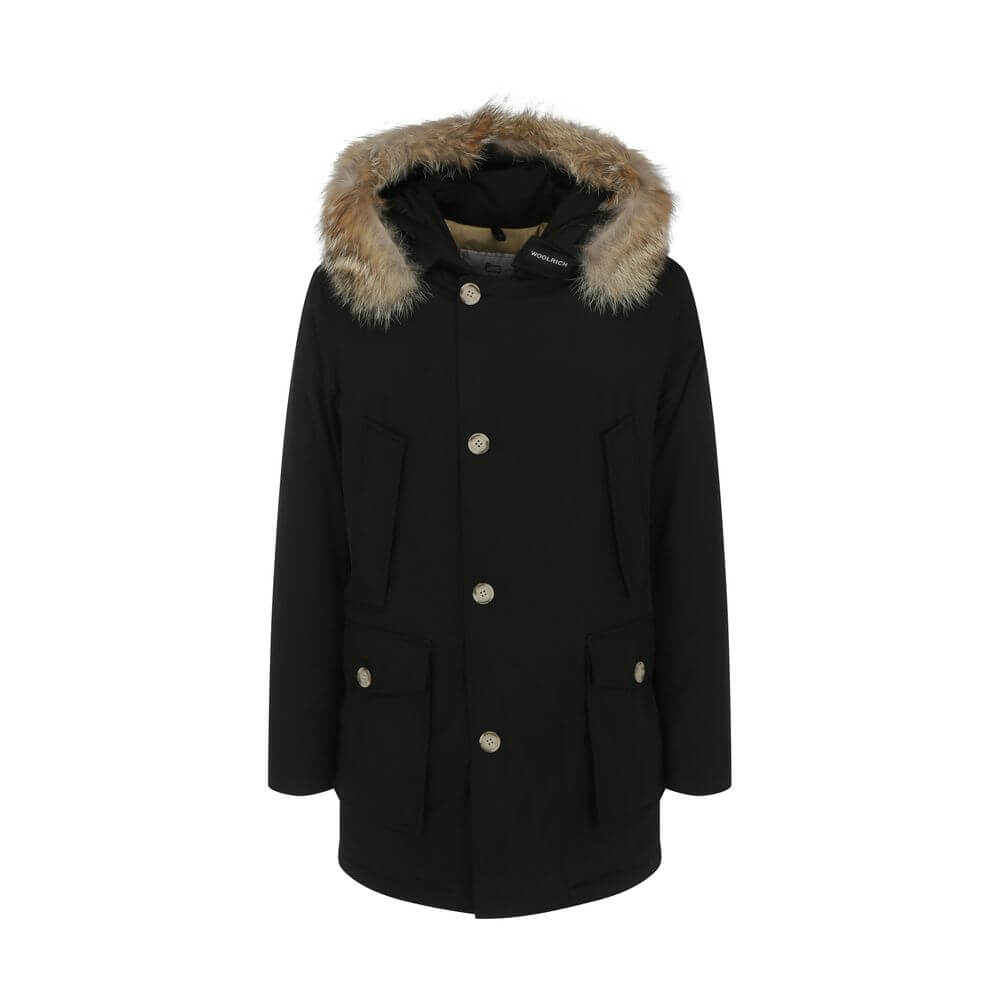 Black Cotton ParkaParka Arctic Jacket by Woolrich Woolen, front closure with invisible zip and cista buttons, two side patch pockets with flap for closure, two welt pockets on the front, patch with iconic brand signature applied on the neckline, elastic r