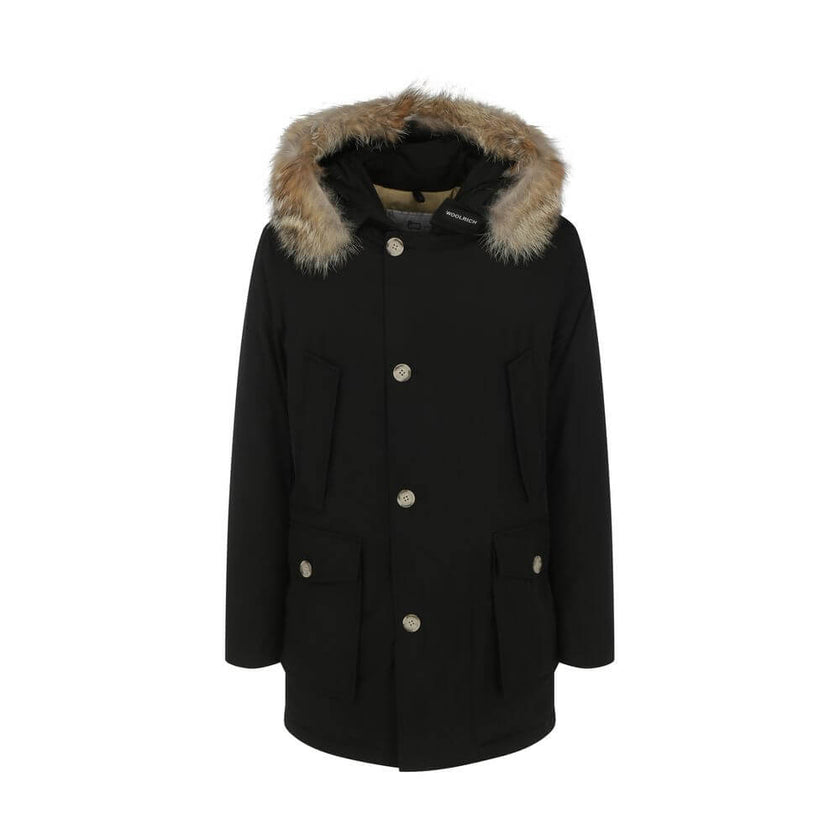 Black Cotton ParkaParka Arctic Jacket by Woolrich Woolen, front closure with invisible zip and cista buttons, two side patch pockets with flap for closure, two welt pockets on the front, patch with iconic brand signature applied on the neckline, elastic r