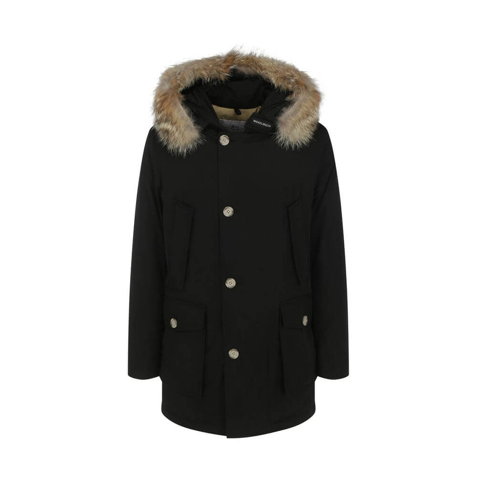 Black Cotton ParkaParka Arctic Jacket by Woolrich Woolen, front closure with invisible zip and cista buttons, two side patch pockets with flap for closure, two welt pockets on the front, patch with iconic brand signature applied on the neckline, elastic r