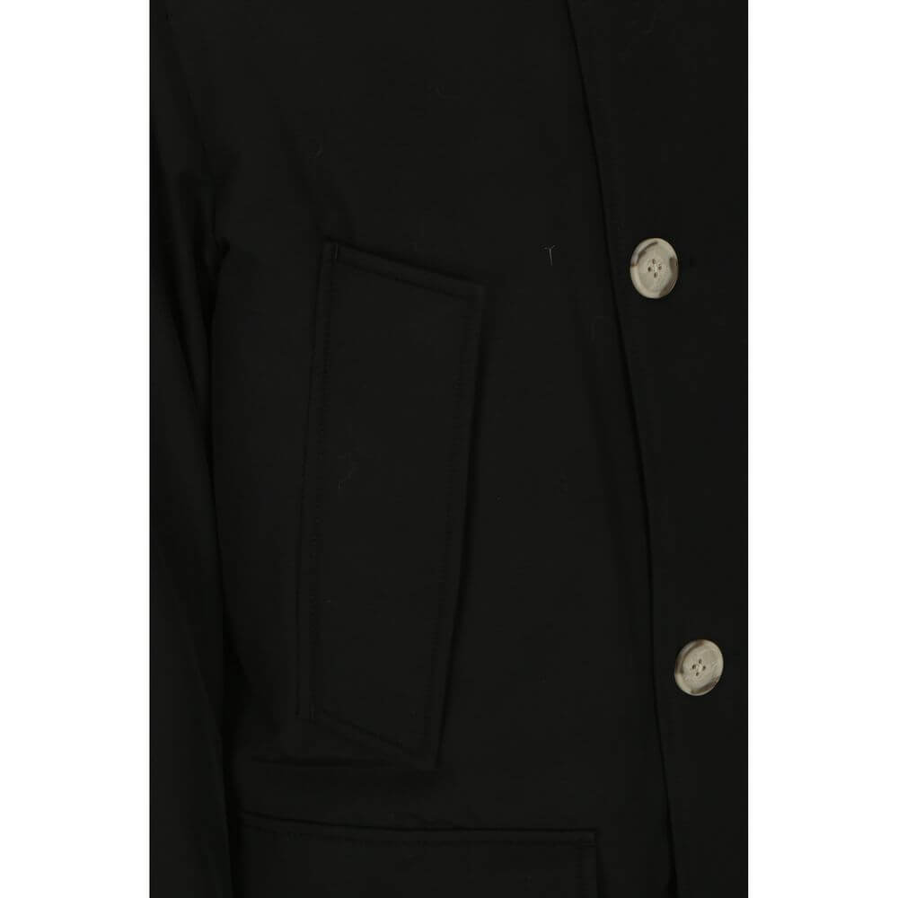 Black Cotton ParkaParka Arctic Jacket by Woolrich Woolen, front closure with invisible zip and cista buttons, two side patch pockets with flap for closure, two welt pockets on the front, patch with iconic brand signature applied on the neckline, elastic r