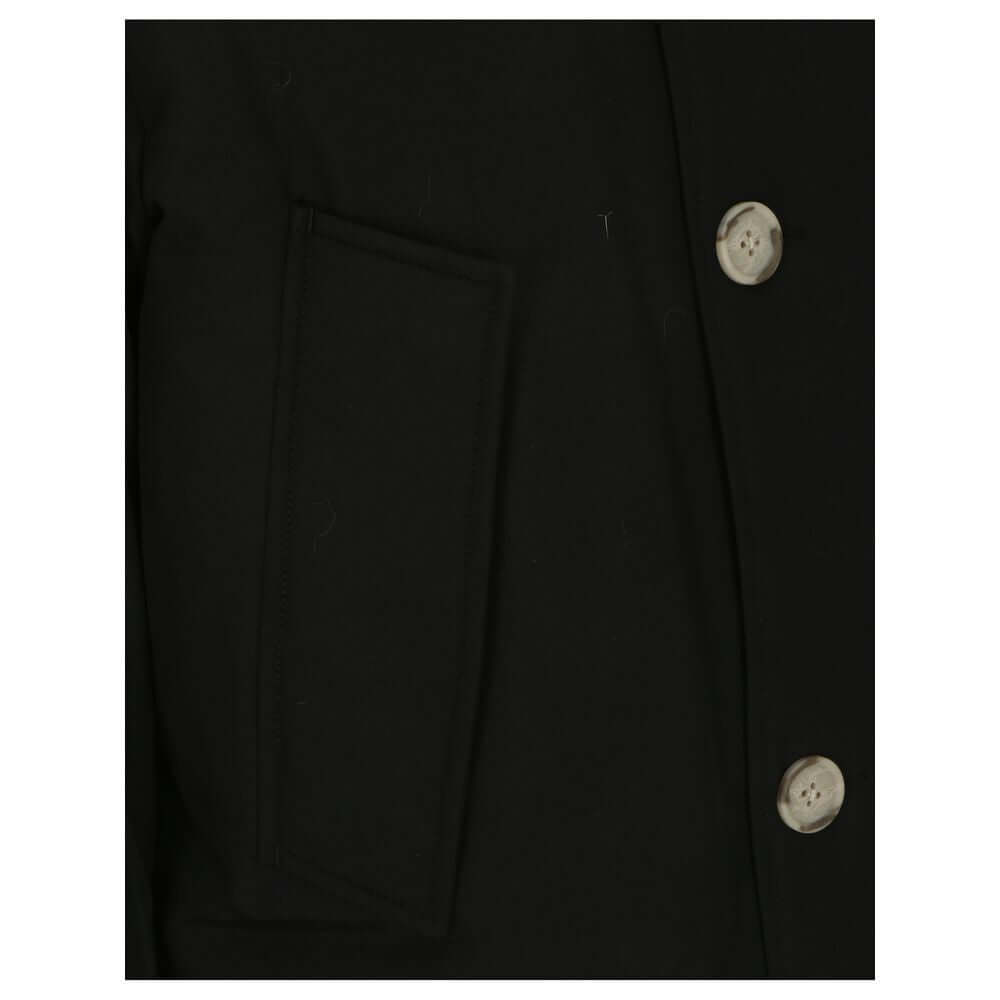 Black Cotton ParkaParka Arctic Jacket by Woolrich Woolen, front closure with invisible zip and cista buttons, two side patch pockets with flap for closure, two welt pockets on the front, patch with iconic brand signature applied on the neckline, elastic r