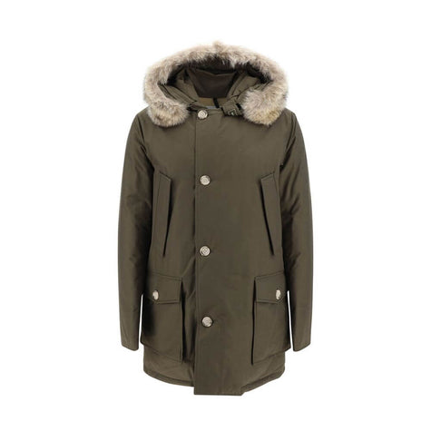 Green Cotton ParkaParka Arctic Jacket by Woolrich Woolen, front closure with invisible zip and cista buttons, two side patch pockets with flap for closure, two welt pockets on the front, patch with iconic brand signature applied on the neckline, elastic r