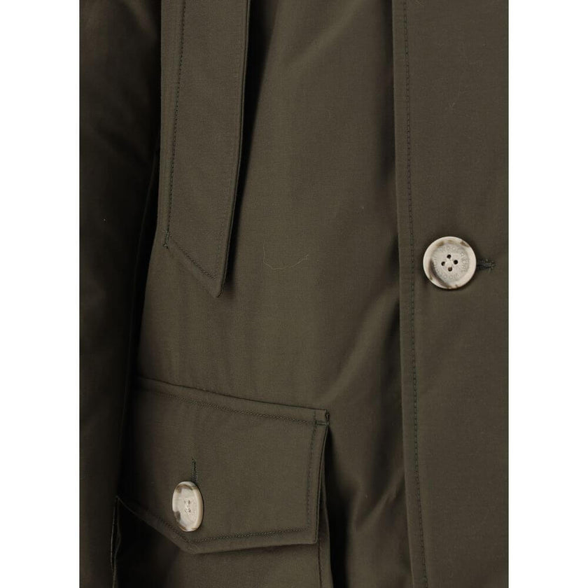 Green Cotton ParkaParka Arctic Jacket by Woolrich Woolen, front closure with invisible zip and cista buttons, two side patch pockets with flap for closure, two welt pockets on the front, patch with iconic brand signature applied on the neckline, elastic r