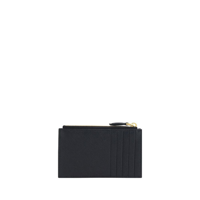 Black Calf Leather Bos Taurus WalletThe Prada Coin Purse is an elegant and practical accessory. The top zip closure ensures the safety of the contents, while the triangular plaque with the brand’s signature on the front adds a distinctive and luxurious to