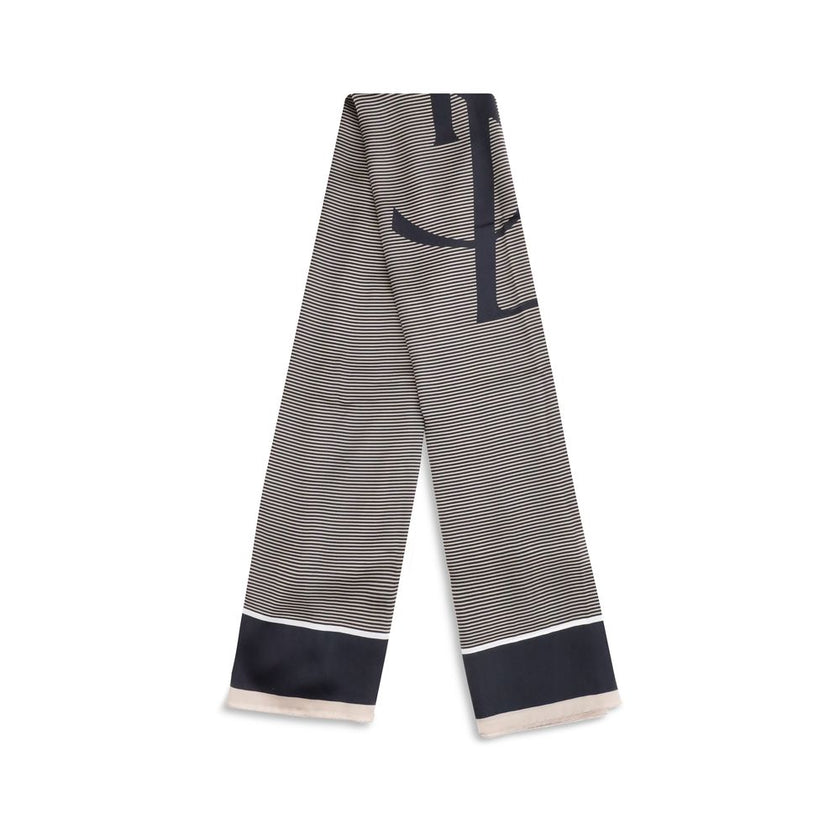 Cassandre striped StoleThe Saint Laurent Semi-Transparent Striped Stole is distinguished by the light elegance of the fabric and the essential design. The Cassandre signature stands out in the center, while the plain border and smooth trim complete the ac