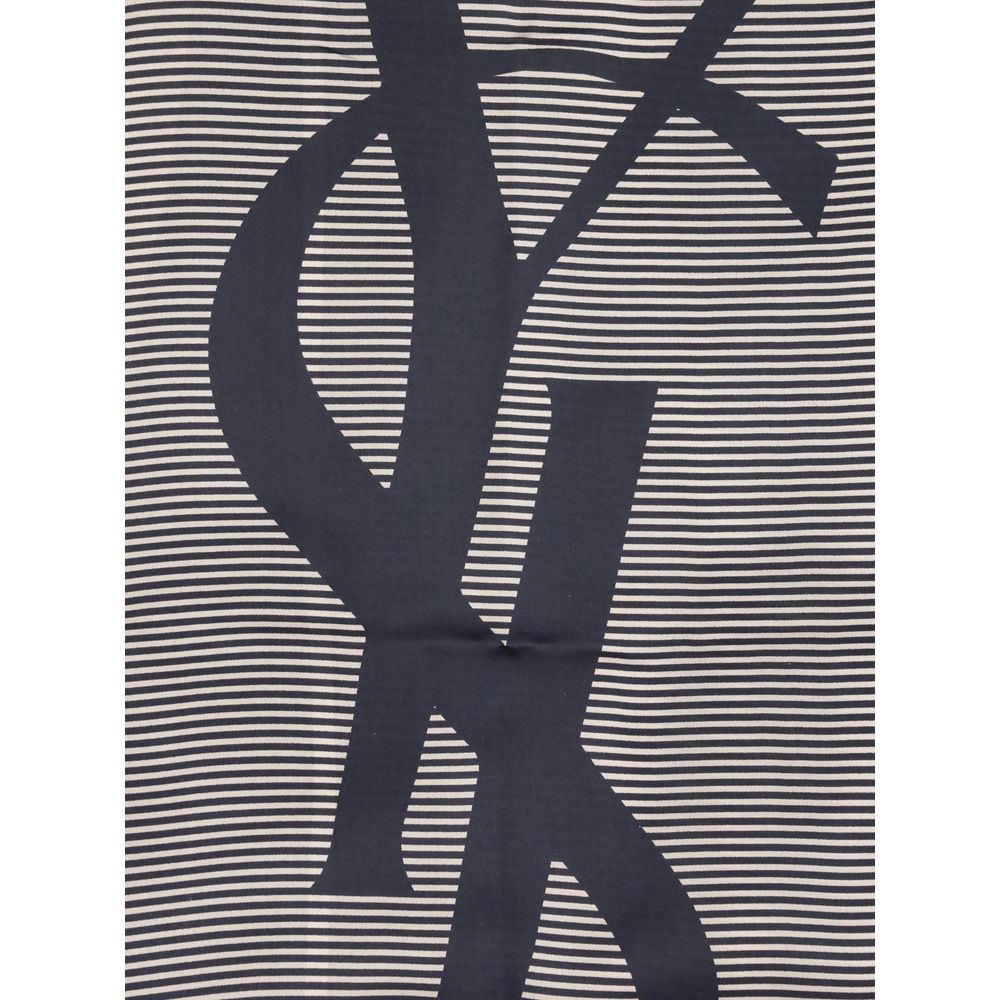 Cassandre striped StoleThe Saint Laurent Semi-Transparent Striped Stole is distinguished by the light elegance of the fabric and the essential design. The Cassandre signature stands out in the center, while the plain border and smooth trim complete the ac
