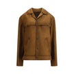 Brown Leather JacketPrada’s signature suede Jacket has an essential and refined design. Featuring a classic collar and a front button closure, it is completed by two welt pockets that enhance its clean lines. An iconic and versatile garment, perfect for a