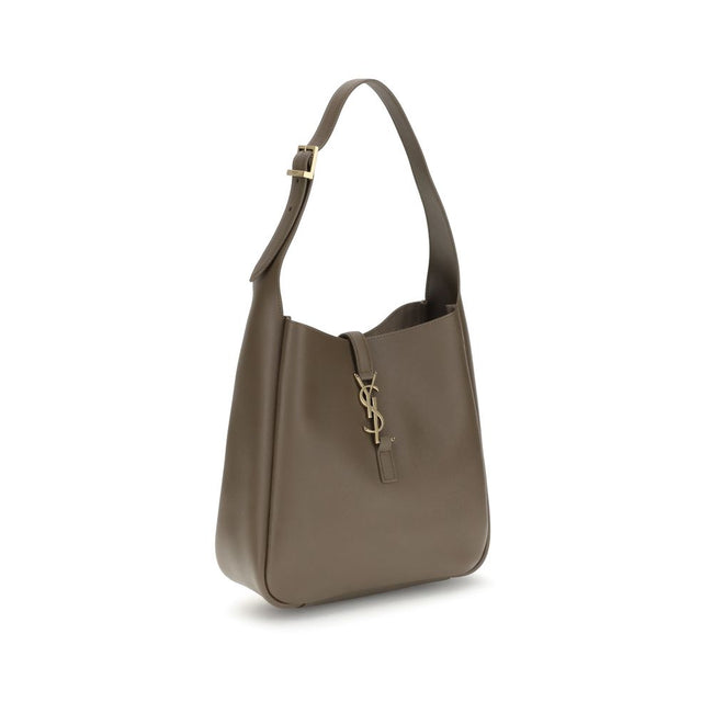Brown Calf Leather Bos Taurus Shoulder BagSaint Laurent’s Cassandre Leather Shoulder Bag is the epitome of contemporary elegance. Featuring a refined hobo design, it features a supple grained leather silhouette and an adjustable shoulder strap with a logo