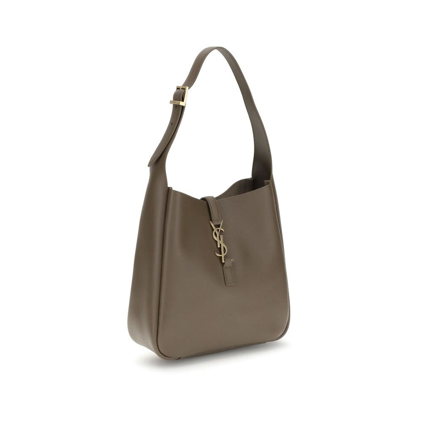 Brown Calf Leather Bos Taurus Shoulder BagSaint Laurent’s Cassandre Leather Shoulder Bag is the epitome of contemporary elegance. Featuring a refined hobo design, it features a supple grained leather silhouette and an adjustable shoulder strap with a logo