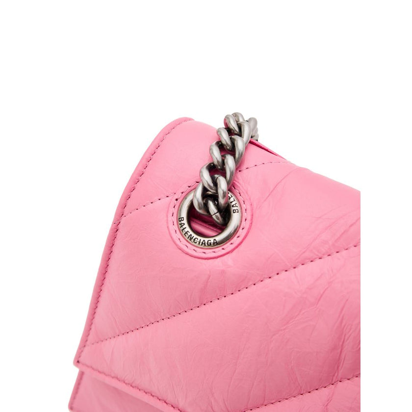 Pink Leather Shoulder BagBalenciaga Crush Shoulder Bag with Silver Chain. Matelassé style, curved design, covered snap closure, silver metal B logo, two internal compartments with zip pocket, double chain. Composition: 100% Leather Brand SKU: 716351210J05