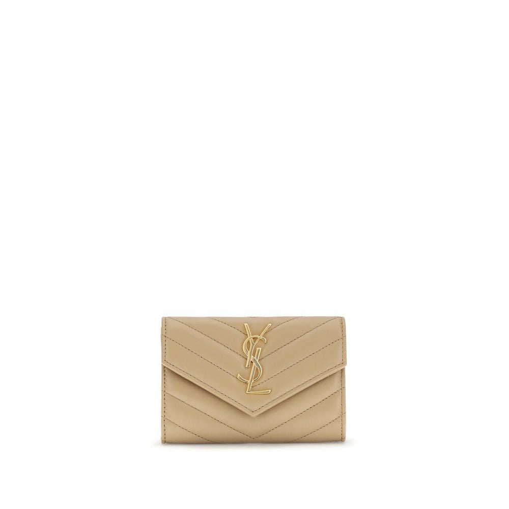 WalletThe Saint Laurent Cassandre leather Wallet combines elegance and functionality with a quilted matelassé design and front flap with magnetic closure. Embellished with the iconic three-dimensional metal YSL logo, it features a coin compartment, card s