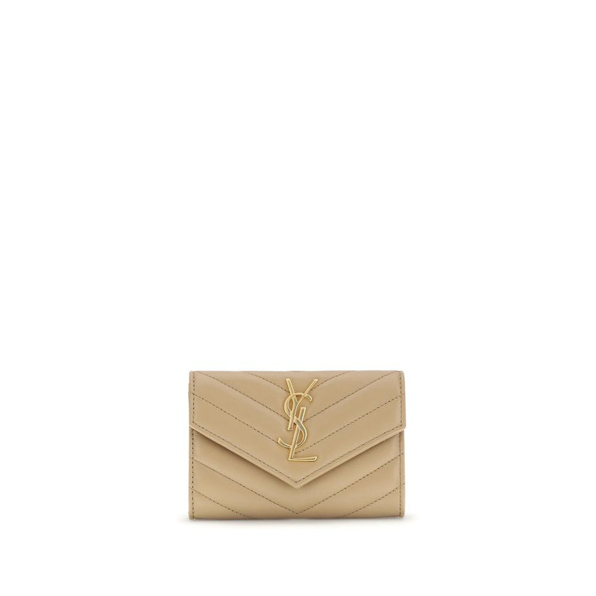 WalletThe Saint Laurent Cassandre leather Wallet combines elegance and functionality with a quilted matelassé design and front flap with magnetic closure. Embellished with the iconic three-dimensional metal YSL logo, it features a coin compartment, card s
