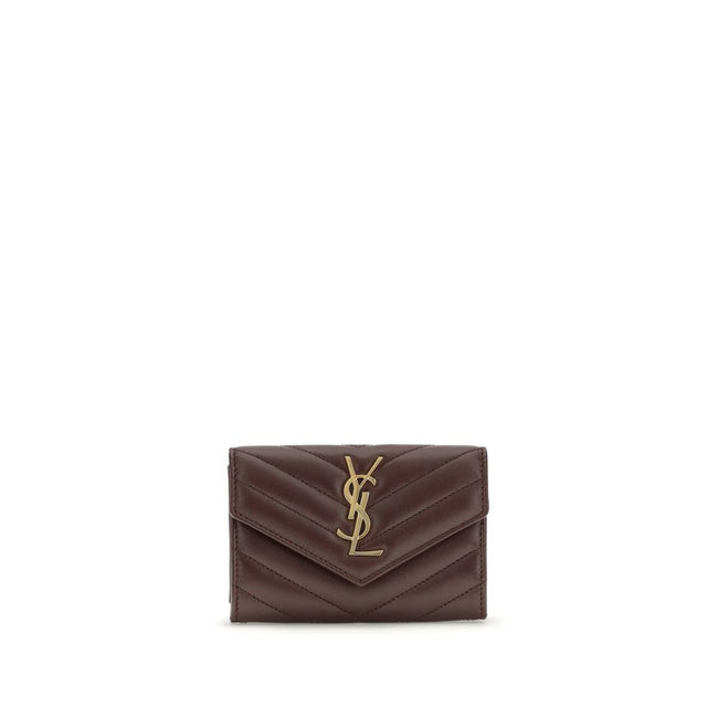 WalletThe Saint Laurent Cassandre leather Wallet combines elegance and functionality with a quilted matelassé design and front flap with magnetic closure. Embellished with the iconic three-dimensional metal YSL logo, it features a coin compartment, card s