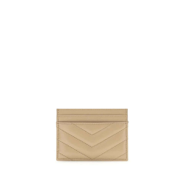 Beige Lamb Ovis Aries Aries WalletSaint Laurent’s lambskin Card Holder is a compact and sophisticated accessory made of soft leather with quilted workmanship. The front features a plaque embossed with the iconic YSL monogram, a symbol of timeless elegance