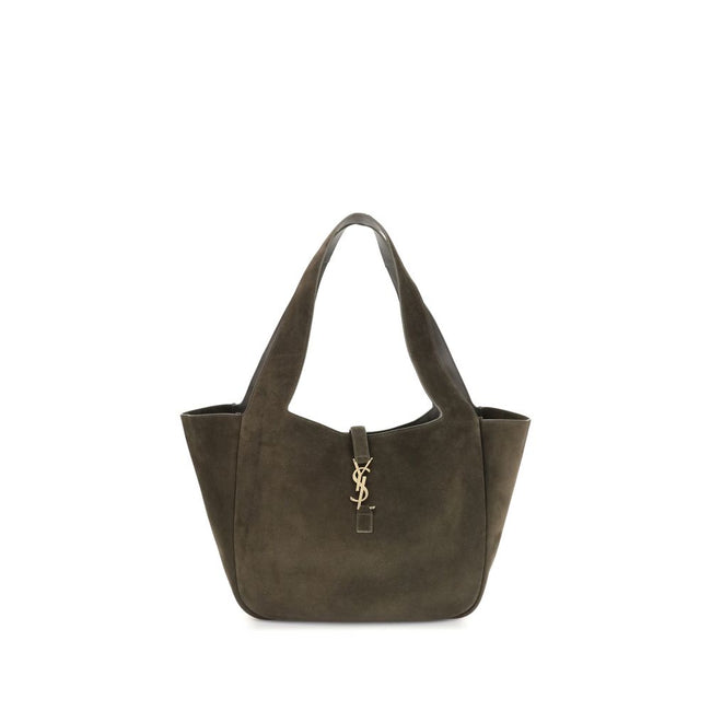 Green Calf Leather Bos Taurus Shoulder BagThe Le 5 à 7 Bea Tote Bag by Saint Laurent, made of suede leather, is an elegant versatile accessory with a refined design. The closure features a strap with a Cassandre logo plaque and a snap button, giving it a