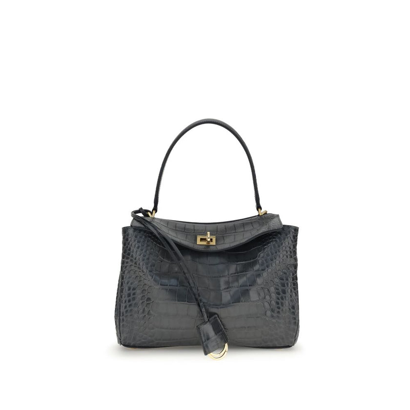 Black Calf Leather Bos Taurus Shoulder BagThe Rodeo Shoulder Bag in crocodile-print leather by Balenciaga features a top handle for a comfortable and elegant grip. The front closure is equipped with a flap and turn lock, adding a distinctive and functiona