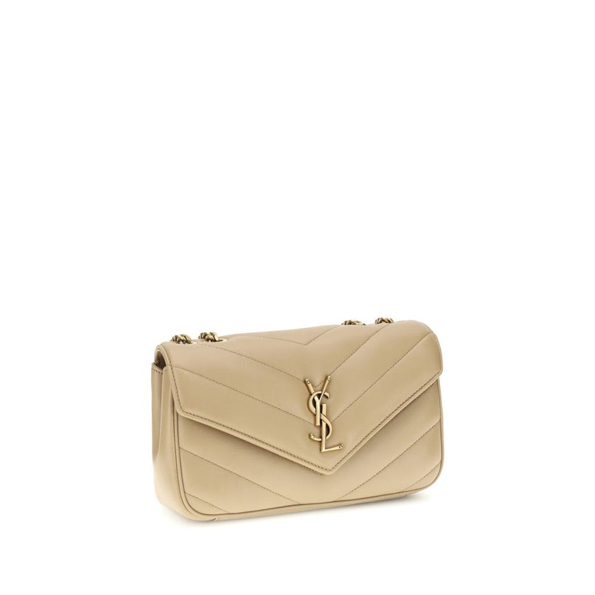 Beige Lamb Ovis Aries Aries Shoulder BagThe LouLou Shoulder Bag by Saint Laurent is an icon of timeless elegance. Crafted with the unmistakable quilted design, it features a front closure with magnetic flap embellished with the brass logo applied on the f