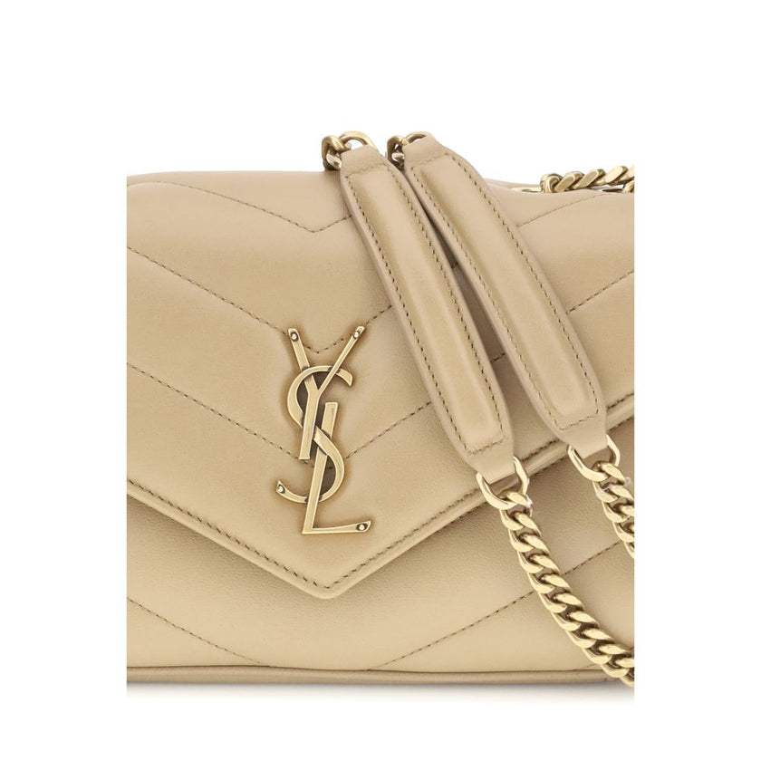 Beige Lamb Ovis Aries Aries Shoulder BagThe LouLou Shoulder Bag by Saint Laurent is an icon of timeless elegance. Crafted with the unmistakable quilted design, it features a front closure with magnetic flap embellished with the brass logo applied on the f