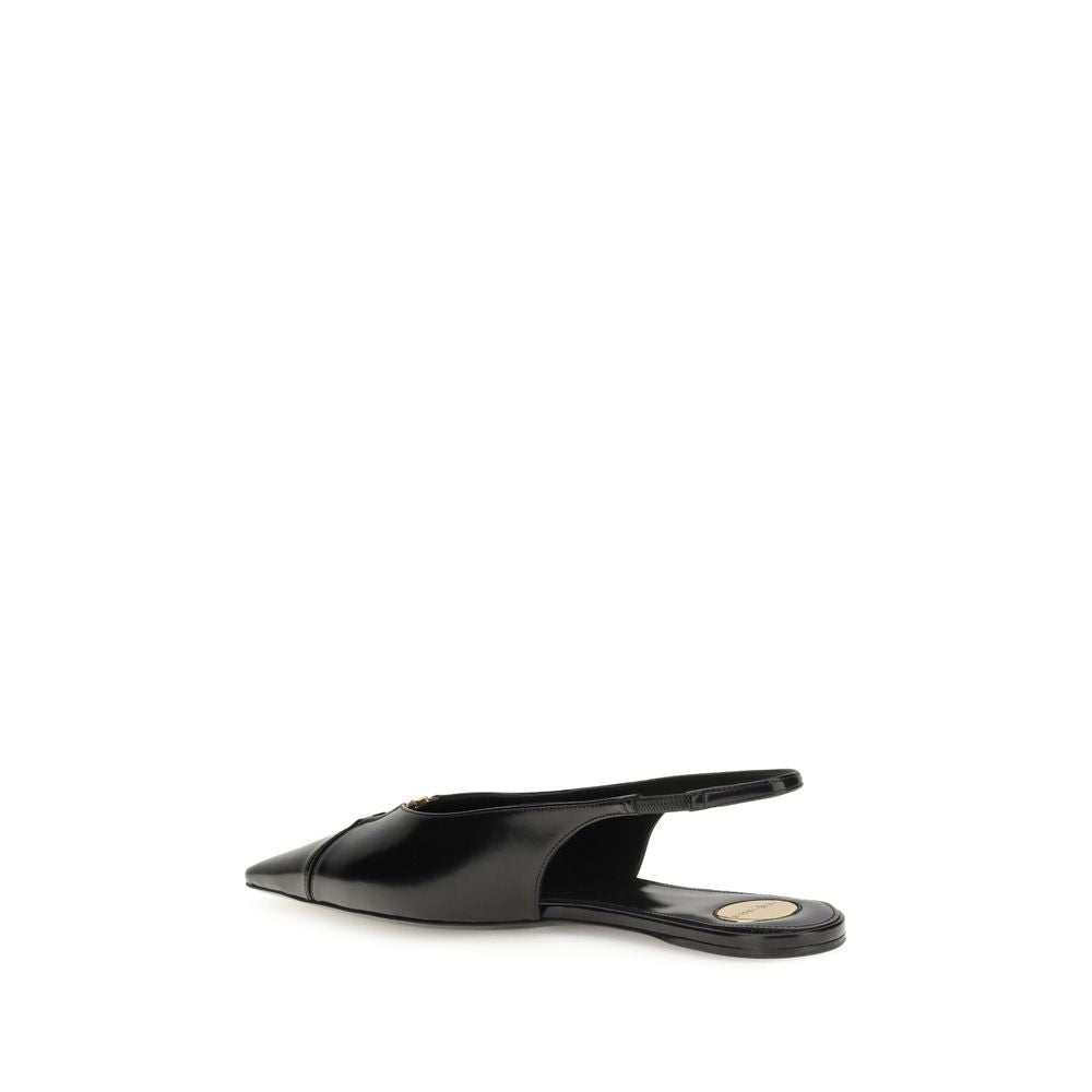 Black Calf Leather Bos Taurus Ballet FlatsSaint Laurent’s Babylon Ballerinas reinterpret classic elegance with a distinctive modern twist. Open at the back, they feature a sleek silhouette thanks to an elongated cut-out toe, embellished with the iconic CA