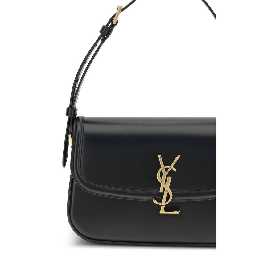Black Calf Leather Bos Taurus Shoulder BagThe medium Solferino Shoulder Bag by Saint Laurent is an elegant reinterpretation of the iconic model, crafted in fine Box leather. Characterized by slightly rounded lines, it is distinguished by a sliding closure