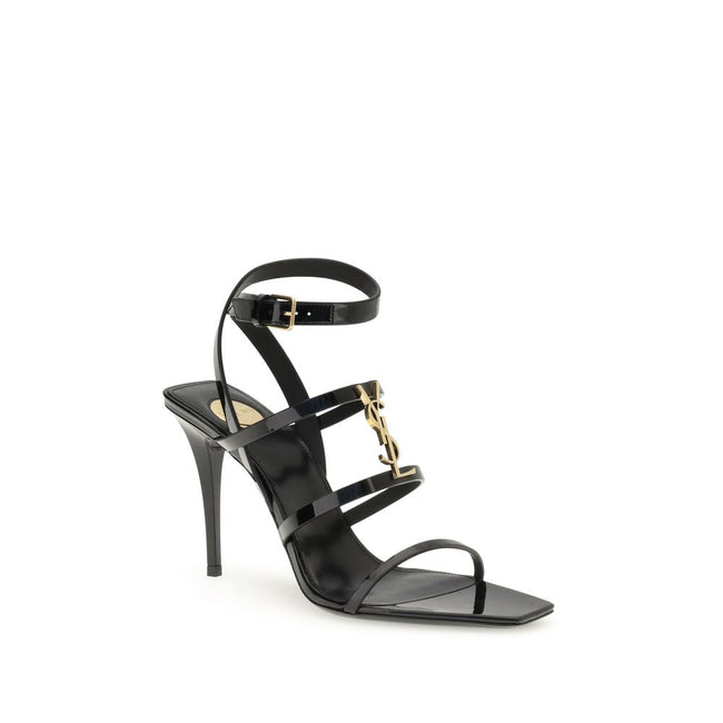 Black Calf Leather Bos Taurus Stiletto Heel SandalsSaint Laurent’s Cassandra Sandals embody the brand’s bold elegance. Crafted from patent leather, they feature a multi-strap design with a square toe and lacquered stiletto heel that slims the figure with