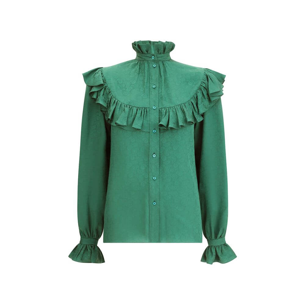 Green Silk BlouseSaint Laurent’s silk Blouse is an elegant garment with a romantic flair, enhanced by a delicate tone-on-tone paisley pattern. Featuring a mandarin collar and ruffles at the neck, chest and along the sleeves, it has a front button closure