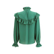 Green Silk BlouseSaint Laurent’s silk Blouse is an elegant garment with a romantic flair, enhanced by a delicate tone-on-tone paisley pattern. Featuring a mandarin collar and ruffles at the neck, chest and along the sleeves, it has a front button closure