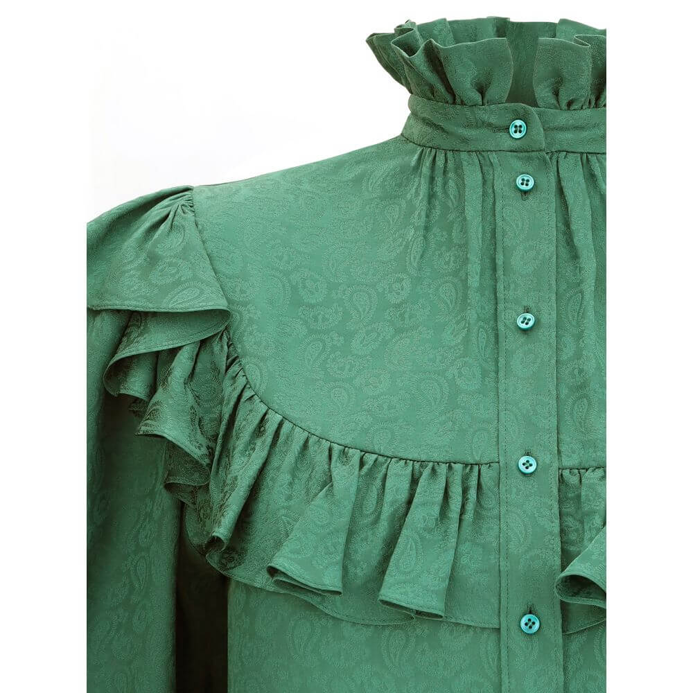 Green Silk BlouseSaint Laurent’s silk Blouse is an elegant garment with a romantic flair, enhanced by a delicate tone-on-tone paisley pattern. Featuring a mandarin collar and ruffles at the neck, chest and along the sleeves, it has a front button closure