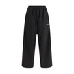 Black Polyester Casual PantsThe Sweatpants by Balenciaga combine comfort and minimalist style. Featuring an elasticized waistband and a straight, wide-leg silhouette, they offer a relaxed, contemporary fit. A straight hem completes the essential design, p