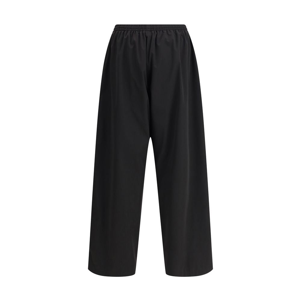 Black Polyester Casual PantsThe Sweatpants by Balenciaga combine comfort and minimalist style. Featuring an elasticized waistband and a straight, wide-leg silhouette, they offer a relaxed, contemporary fit. A straight hem completes the essential design, p