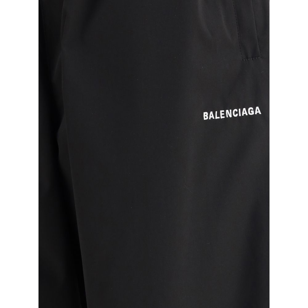 Black Polyester Casual PantsThe Sweatpants by Balenciaga combine comfort and minimalist style. Featuring an elasticized waistband and a straight, wide-leg silhouette, they offer a relaxed, contemporary fit. A straight hem completes the essential design, p