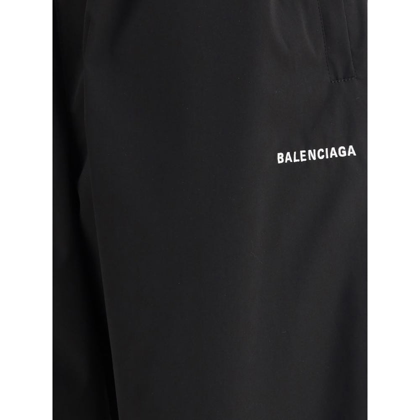Black Polyester Casual PantsThe Sweatpants by Balenciaga combine comfort and minimalist style. Featuring an elasticized waistband and a straight, wide-leg silhouette, they offer a relaxed, contemporary fit. A straight hem completes the essential design, p