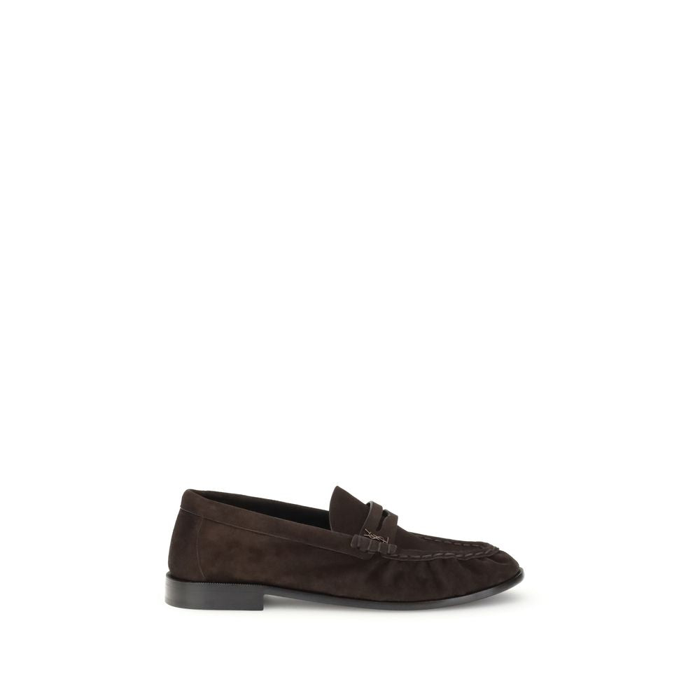 Brown Calf Leather Bos Taurus Slip-On LoafersSaint Laurent’s Cassandre Loafers combine comfort and sophistication in an elegant design. Made of soft leather, they are embellished with the gold metal Cassandre decoration and hand-stitched moc toe, a sign o