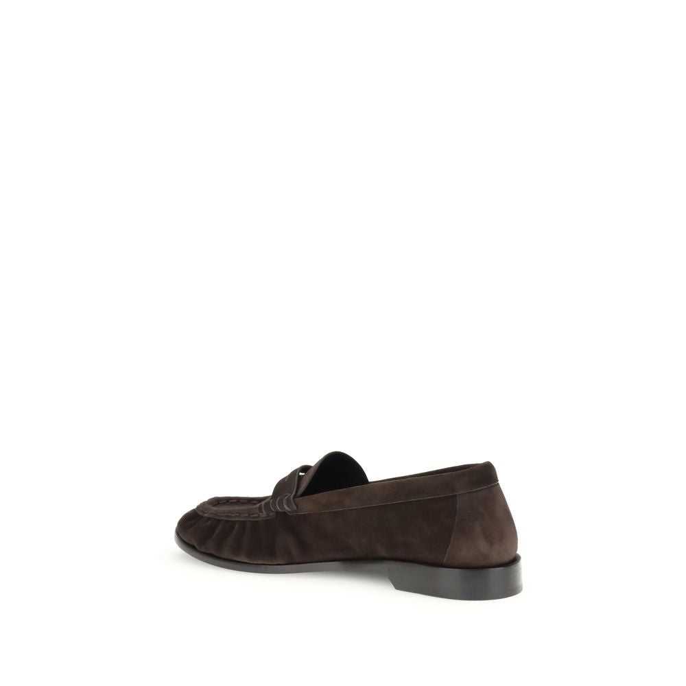 Brown Calf Leather Bos Taurus Slip-On LoafersSaint Laurent’s Cassandre Loafers combine comfort and sophistication in an elegant design. Made of soft leather, they are embellished with the gold metal Cassandre decoration and hand-stitched moc toe, a sign o